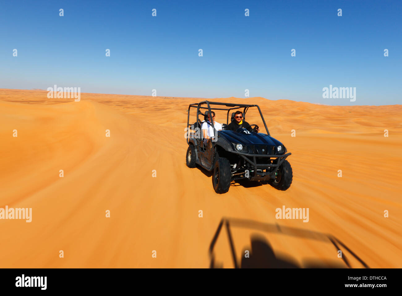 La conduite en quad dans le désert de Dubaï Banque D'Images La conduite en quad dans le désert de Dubaï Banque D'Images
