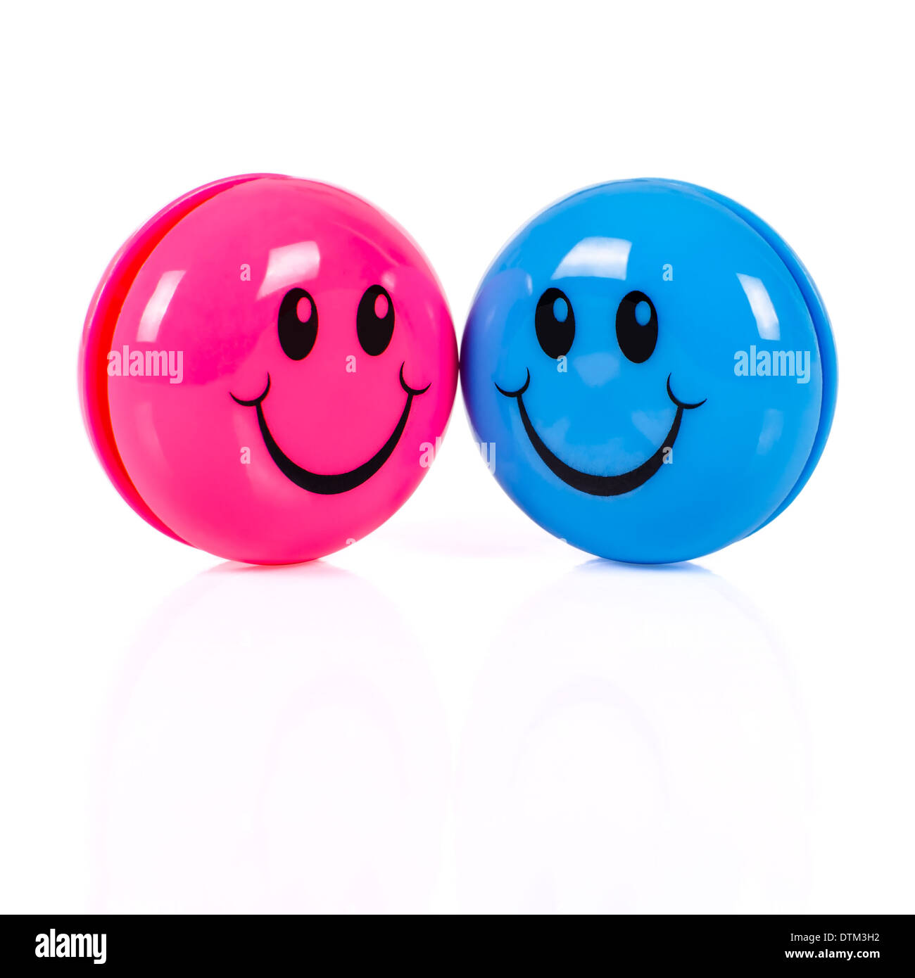 Smileys rose et bleu isolé sur fond blanc Banque D'Images