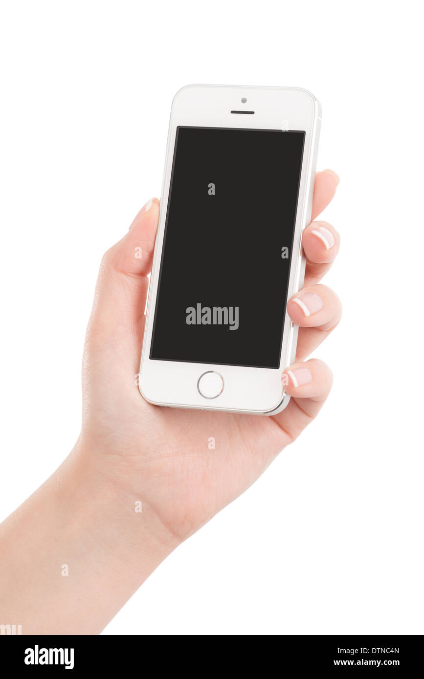 Main tenant femelle blanc moderne téléphone intelligent avec écran blanc isolé sur fond blanc. Haute qualité. Banque D'Images