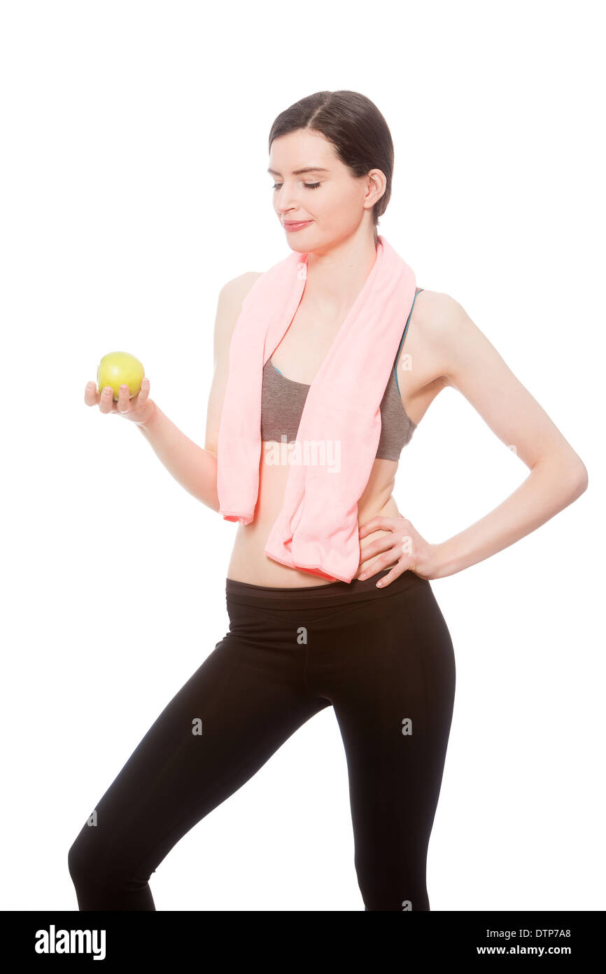 Modèle fitness avec pomme Banque D'Images