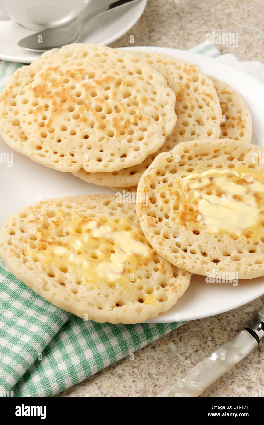 Hot buttered pikelets une variation régionale de la crumpet traditionnels Banque D'Images