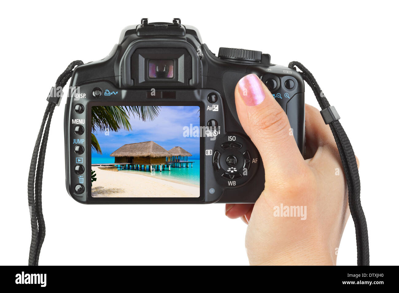 Appareil photo en main et paysage plage Banque D'Images