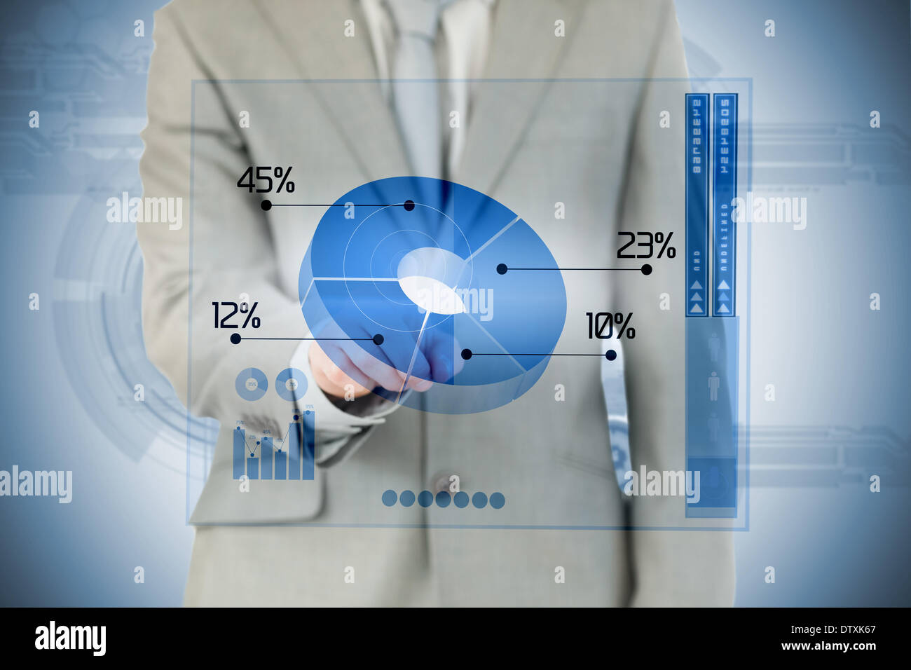 Businessman using blue pie chart interface Banque D'Images