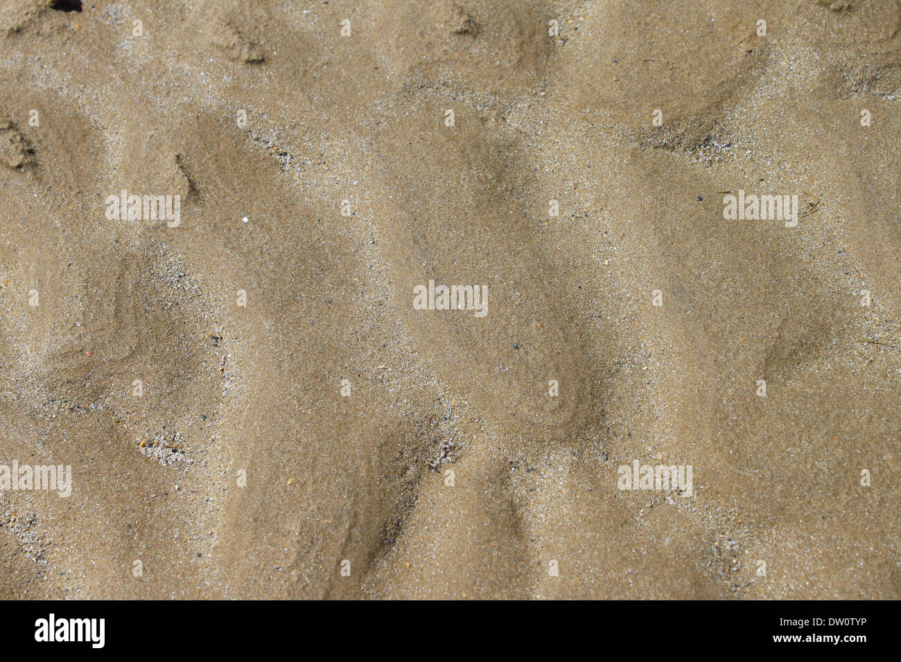 Le sable après la vague Banque D'Images