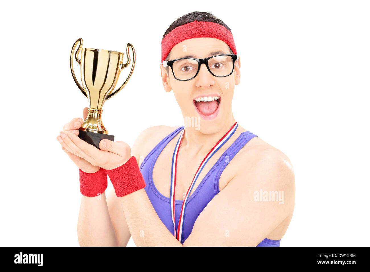 Jeune homme tient un trophée champion Banque D'Images