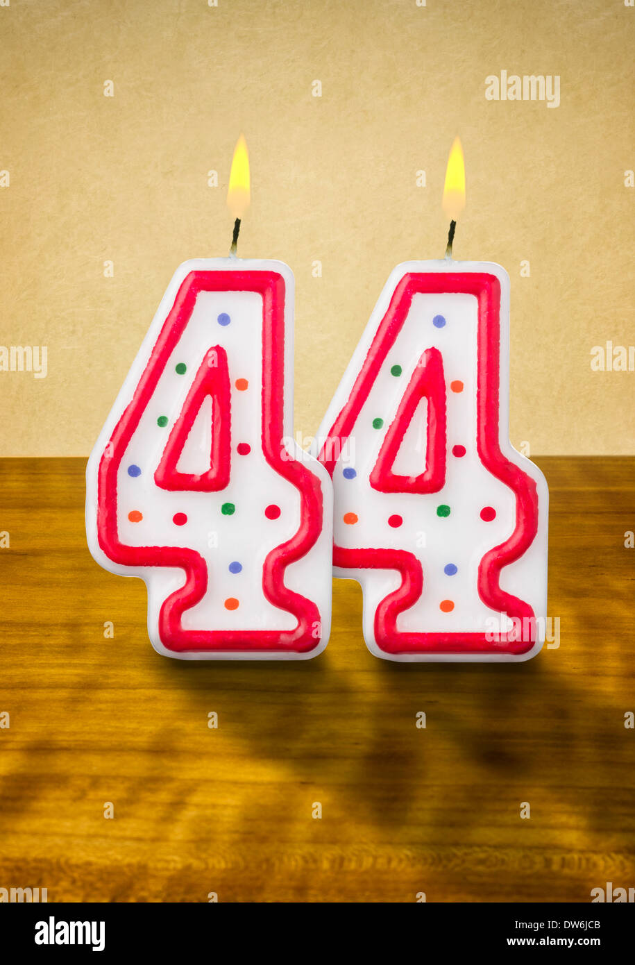 Burning birthday candles numéro 44 Banque D'Images