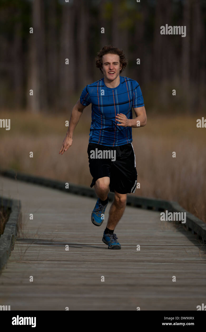 Boy running, Louisiane, 16 ans Banque D'Images
