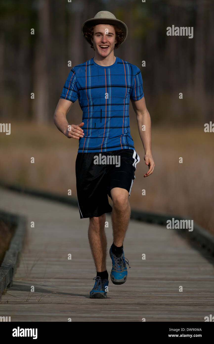 Boy running, Louisiane, 16 ans Banque D'Images