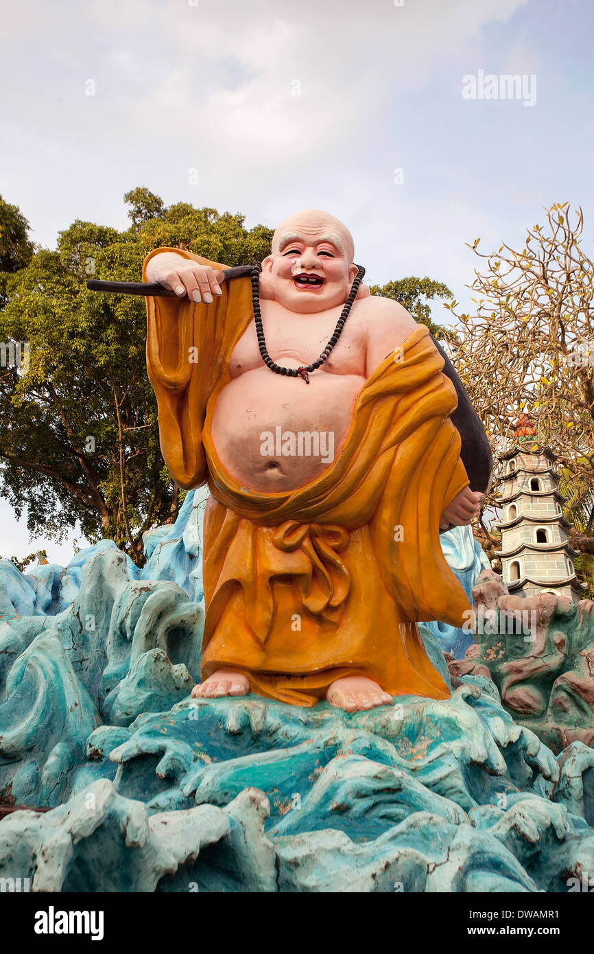 Singapour - 1 février 2014 : Ho Tai Laughing Buddha statue à Haw Par Villa Parc à thème. Banque D'Images