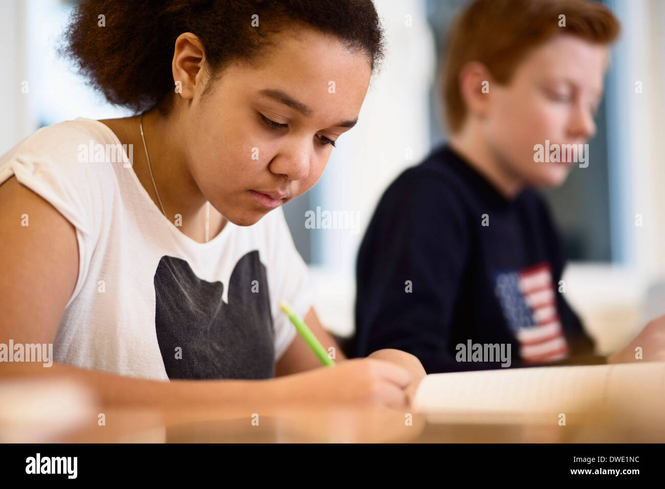 High school girl studying in class Banque D'Images