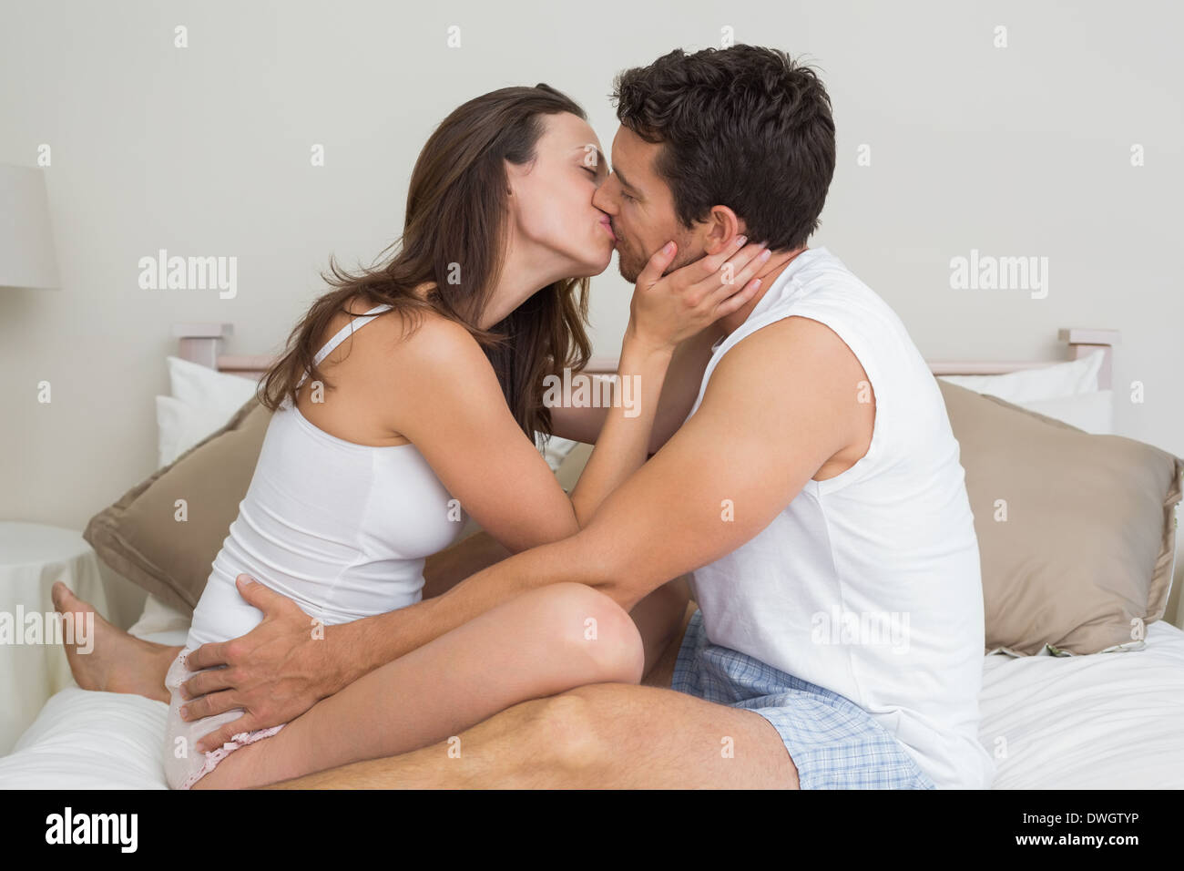 Loving couple in bed Photo Stock - Alamy