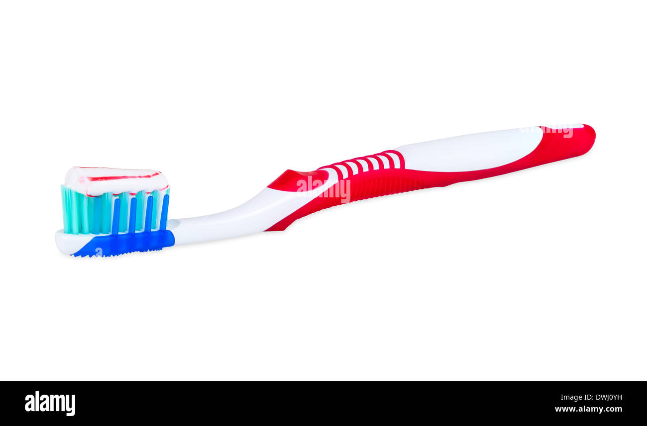 Brosse à dents avec du dentifrice isolé sur fond blanc avec clipping path Banque D'Images