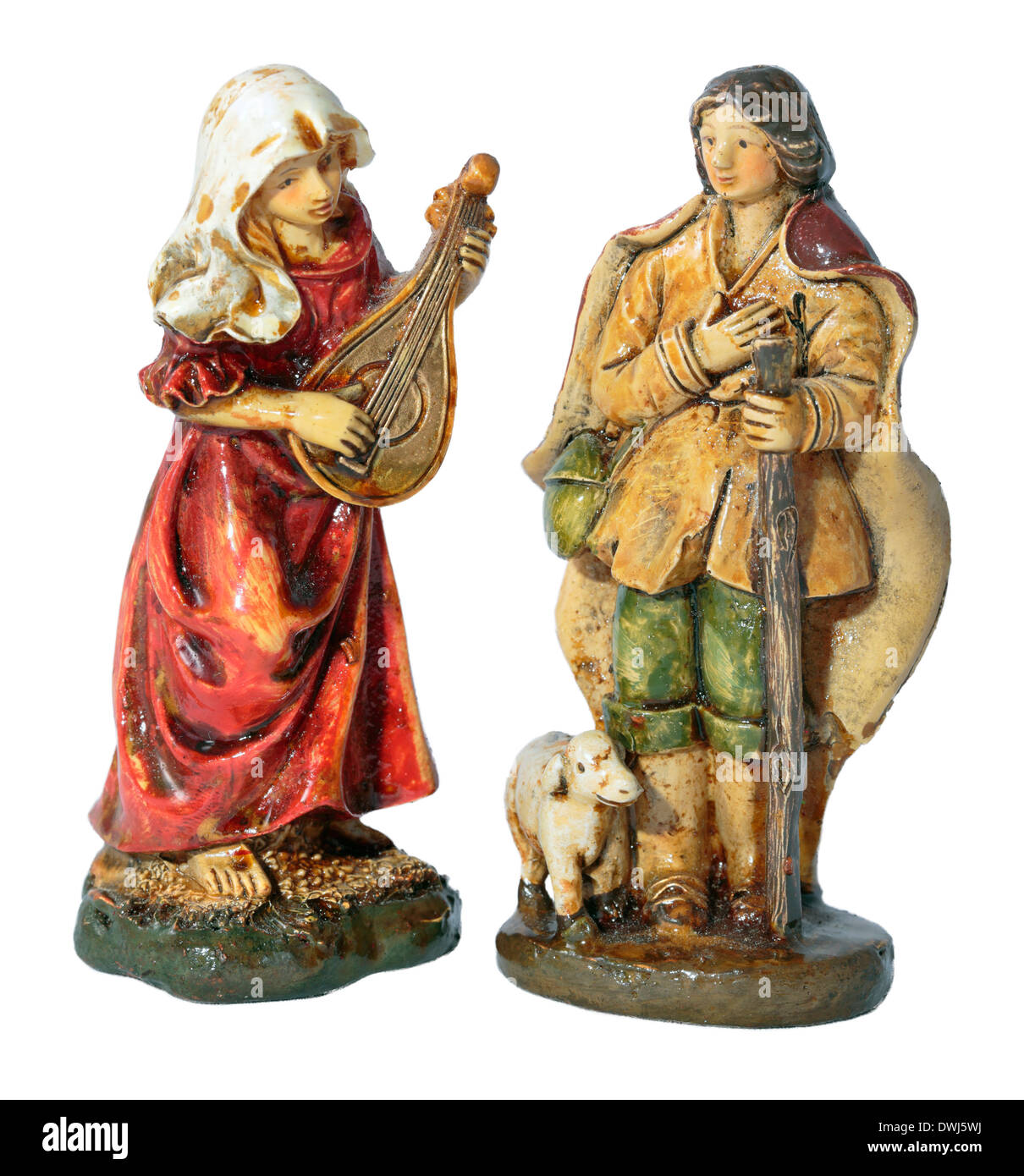 Fille avec luth et Shepherd, figurine en terre cuite de Noël (presepi), Naples, Italie, sur fond blanc Banque D'Images