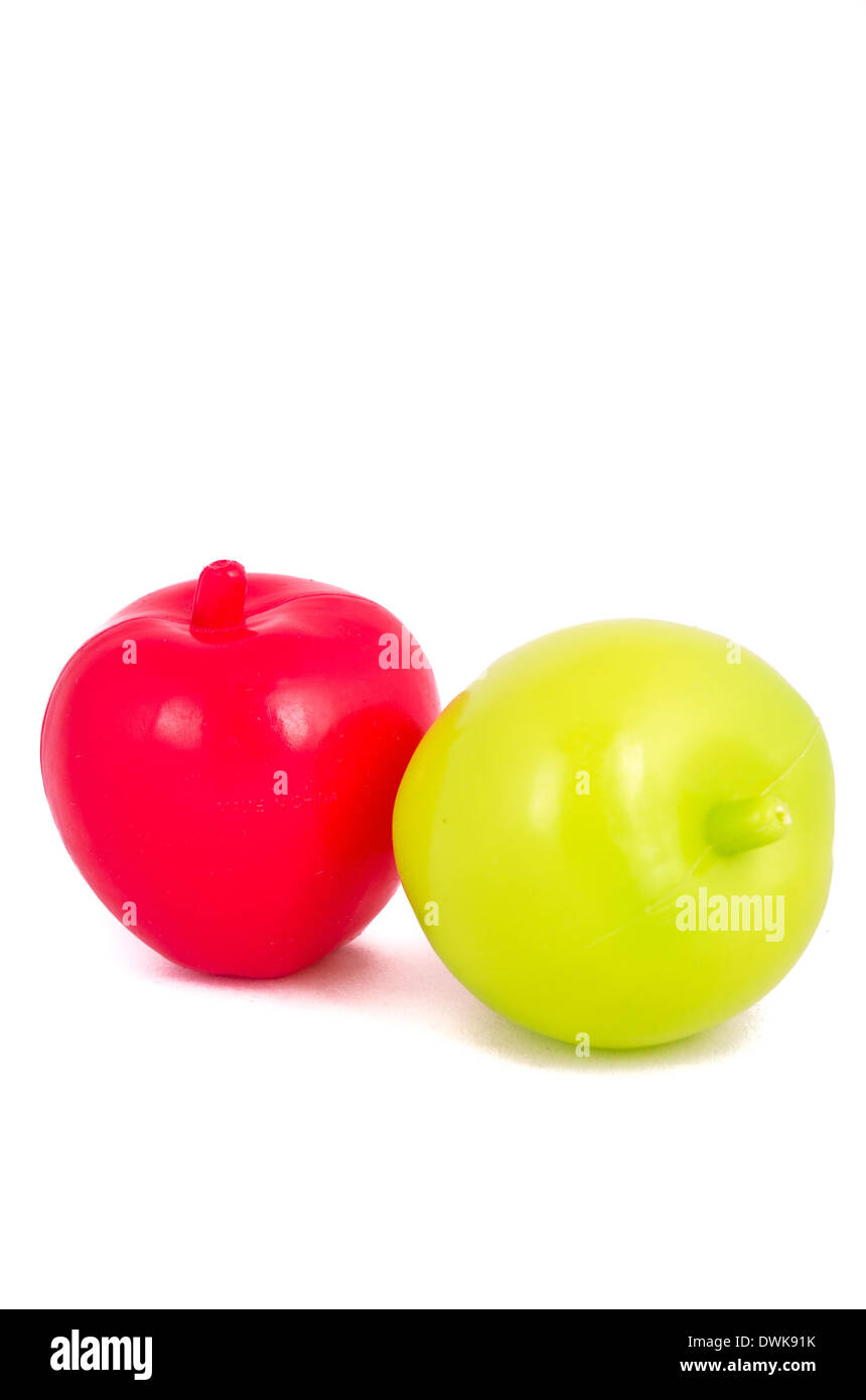 Les fruits en plastique jouet isolated on white Banque D'Images