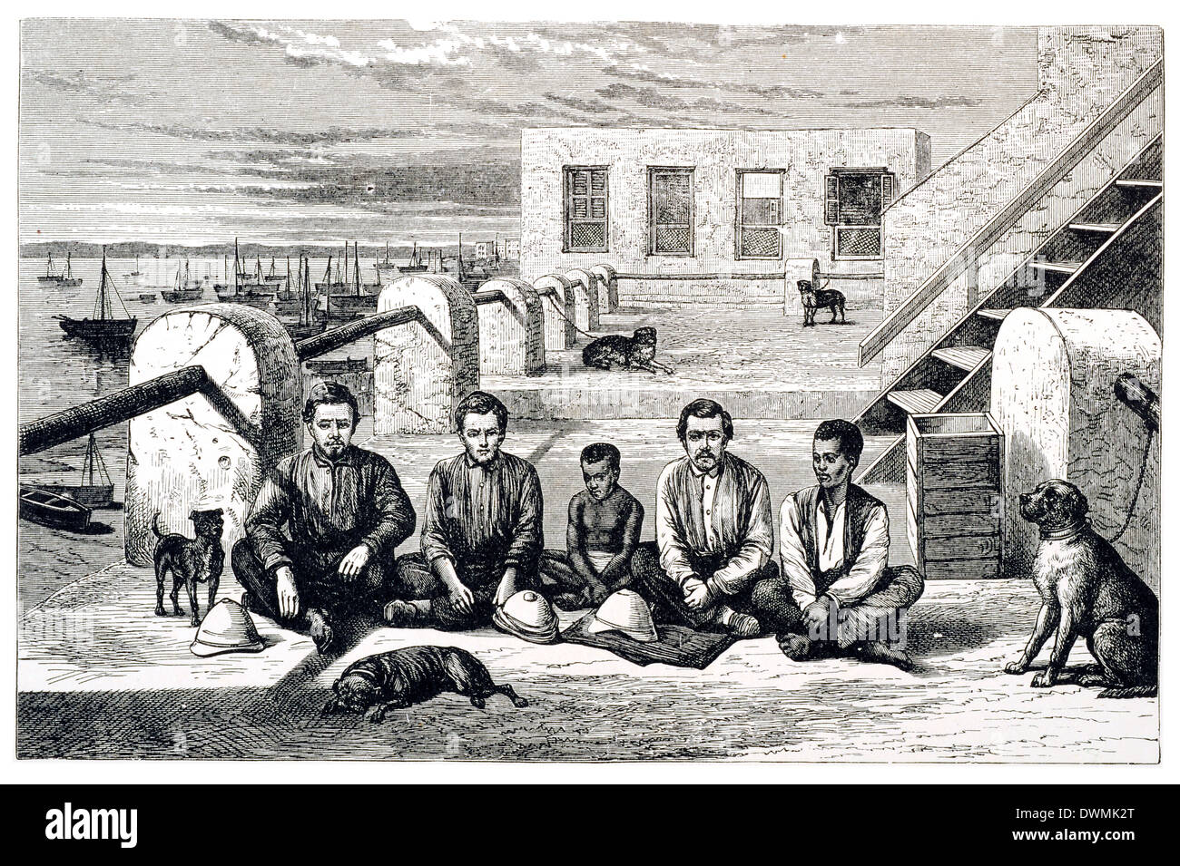 Vue depuis le toit de la maison de M. Auguste Sparhawk L/R Frank Pocock, Fredrick Barker, Zanzibar garçon, Edward Pocock, Kalulu. Banque D'Images