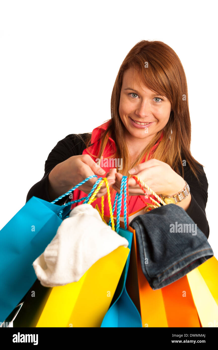Attractive young woman in shopping isolated over white Banque D'Images