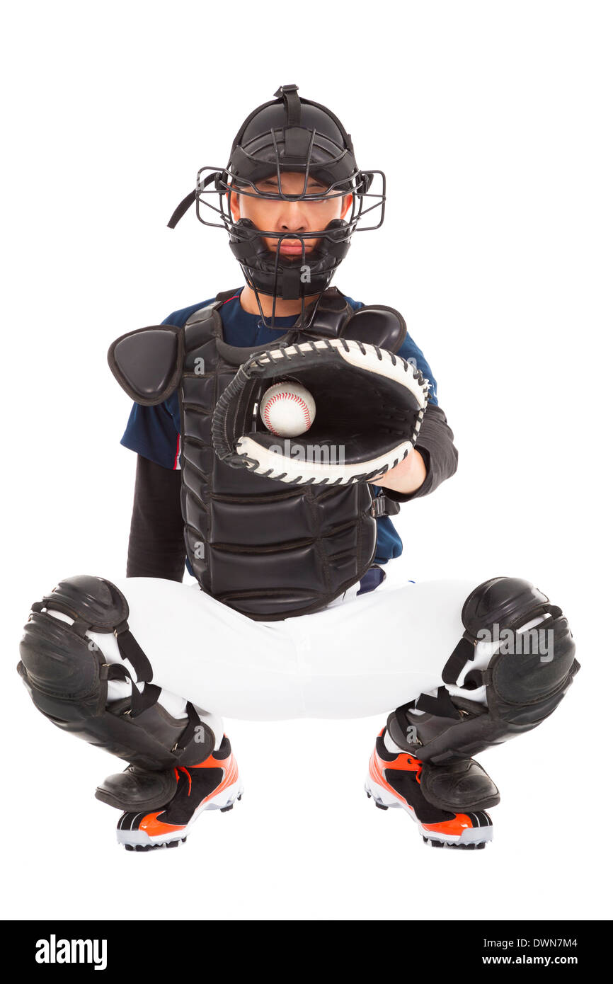 Joueur de baseball, Catcher, pris un base-ball over white Banque D'Images