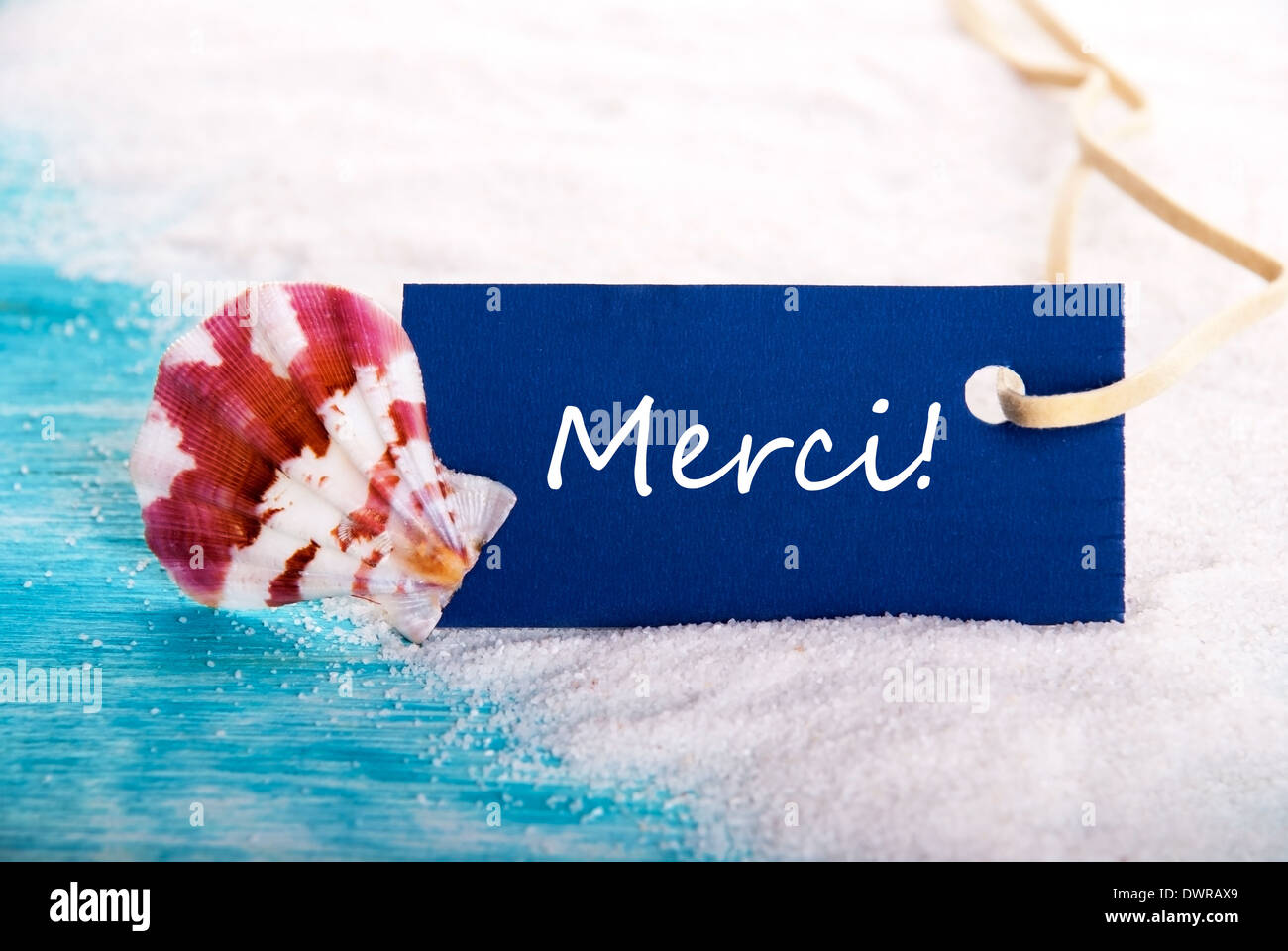 Contexte nautique avec le mot français qui signifie Merci Merci Banque D'Images