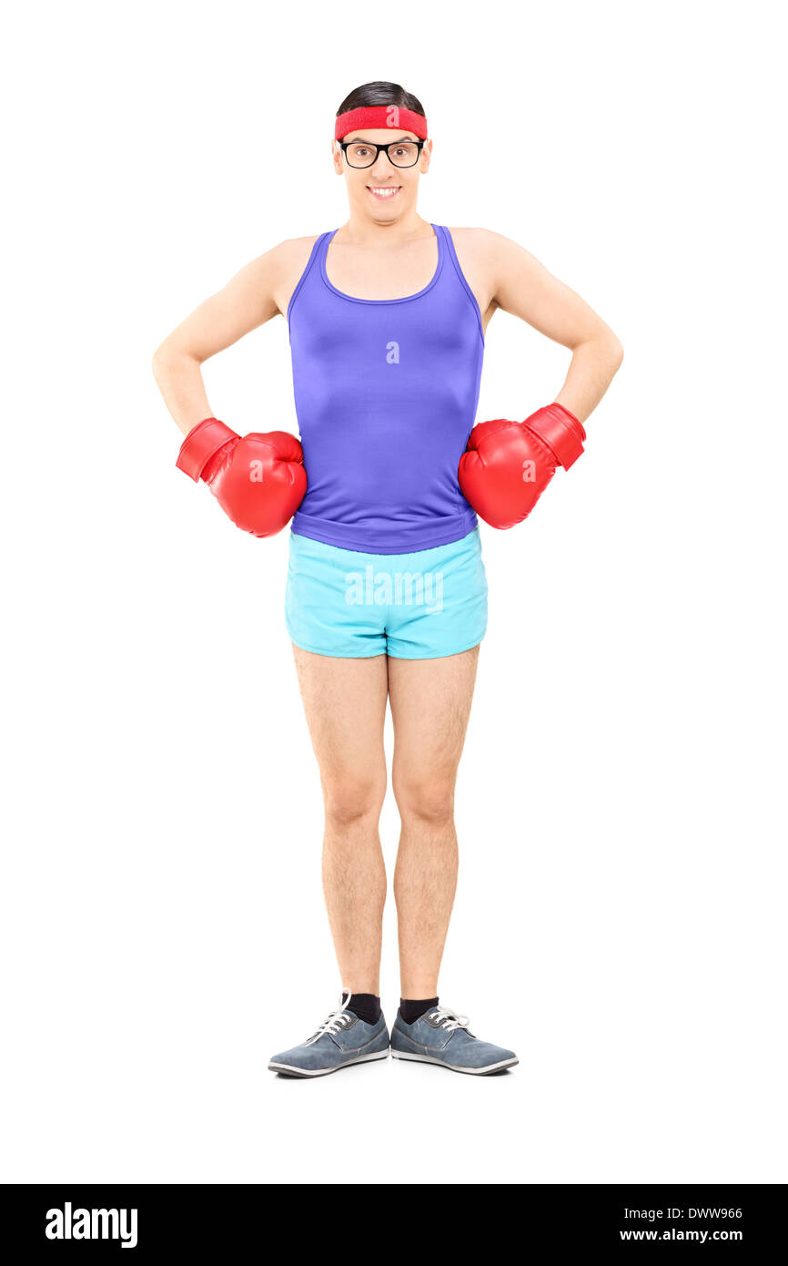 Jeune athlète avec des gants de boxe posing Banque D'Images