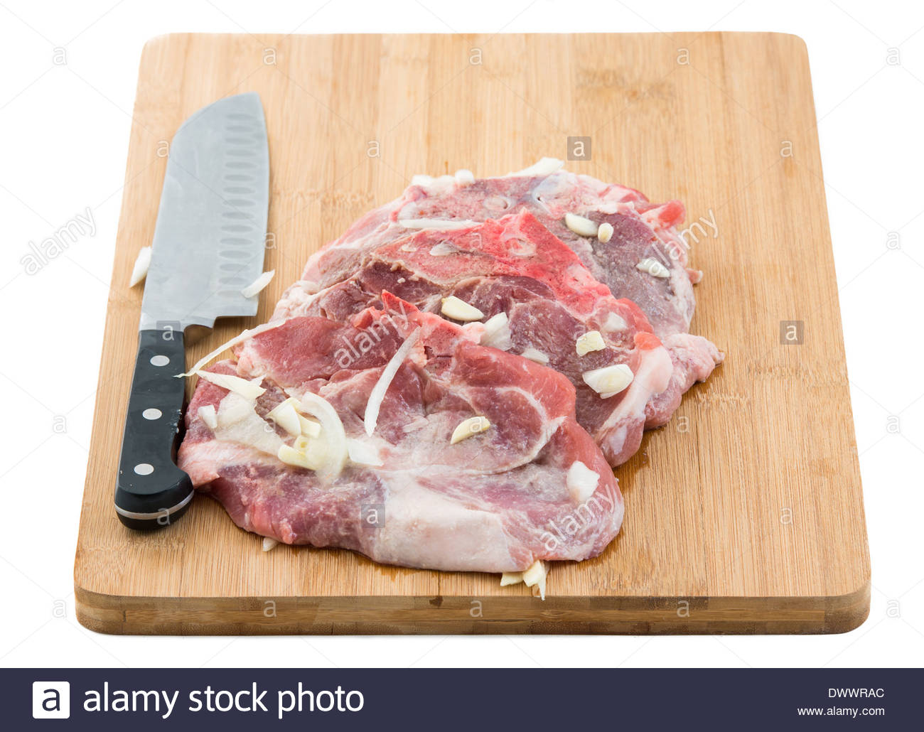 Cotelettes De Porc Cru Marine Sur Une Surlonge De Planche A