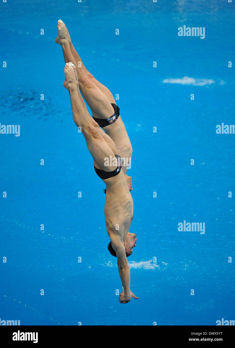 Beijing, Chine. 14 mars 2014. L'Ukraine Oleksandr/Gorshkovozov Illya Kvasha (avant) en concurrence au cours de la Men's tremplin 3m synchro événement à la série mondiale FINA 2014 à Beijing, capitale de Chine, le 14 mars 2014. L'Ukraine Oleksandr/Gorshkovozov Illya Kvasha a remporté la médaille de bronze avec 425,67 points. Banque D'Images