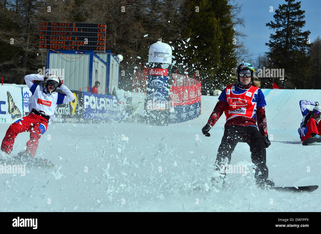 Champion du monde maltais (CAN) droit gagne avec MOENNE LOCCOZ, dans la finale de la Coupe du monde de snowboard cross : 11 mars 2014 à Veysonnaz, Banque D'Images