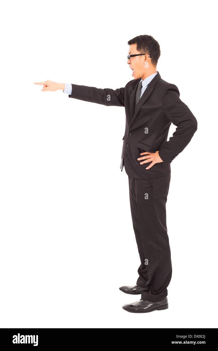 Angry businessman pointing avec cris over white Banque D'Images