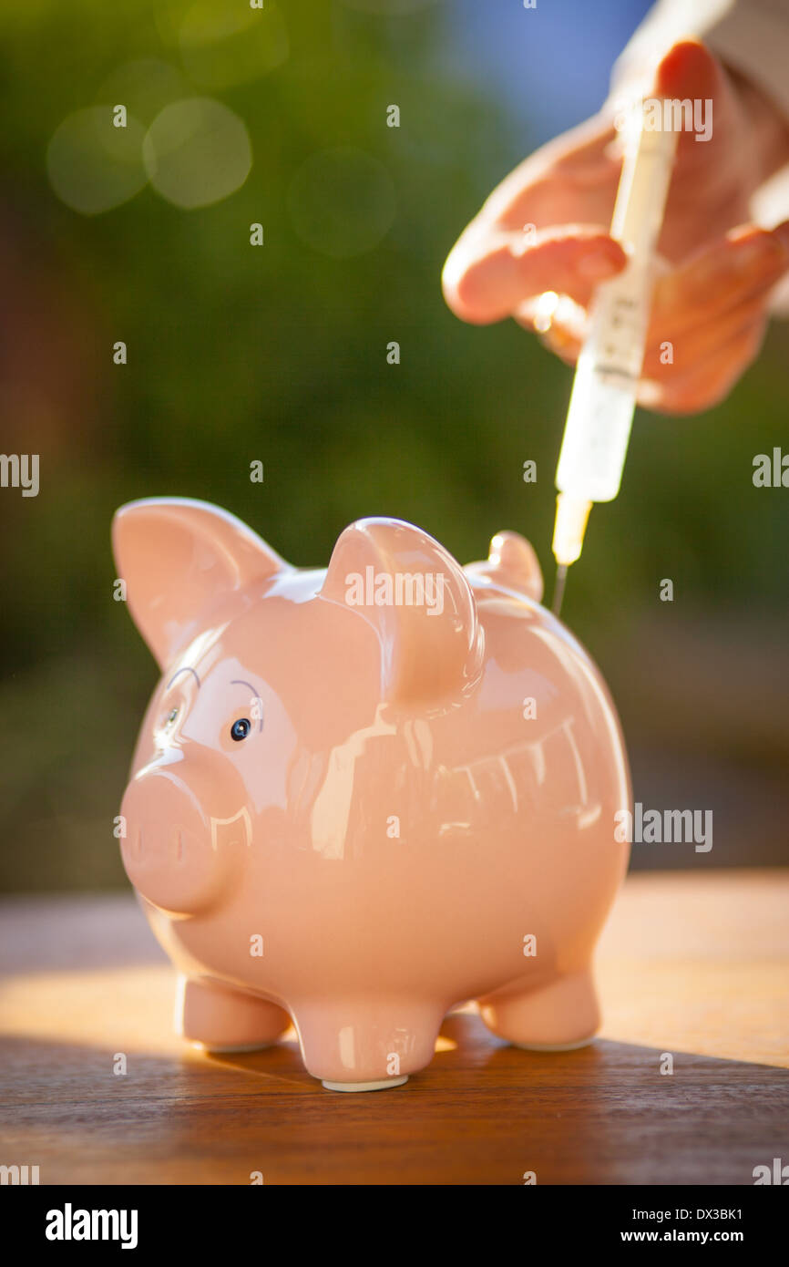 Chine pink piggy bank obtenir une injection Banque D'Images