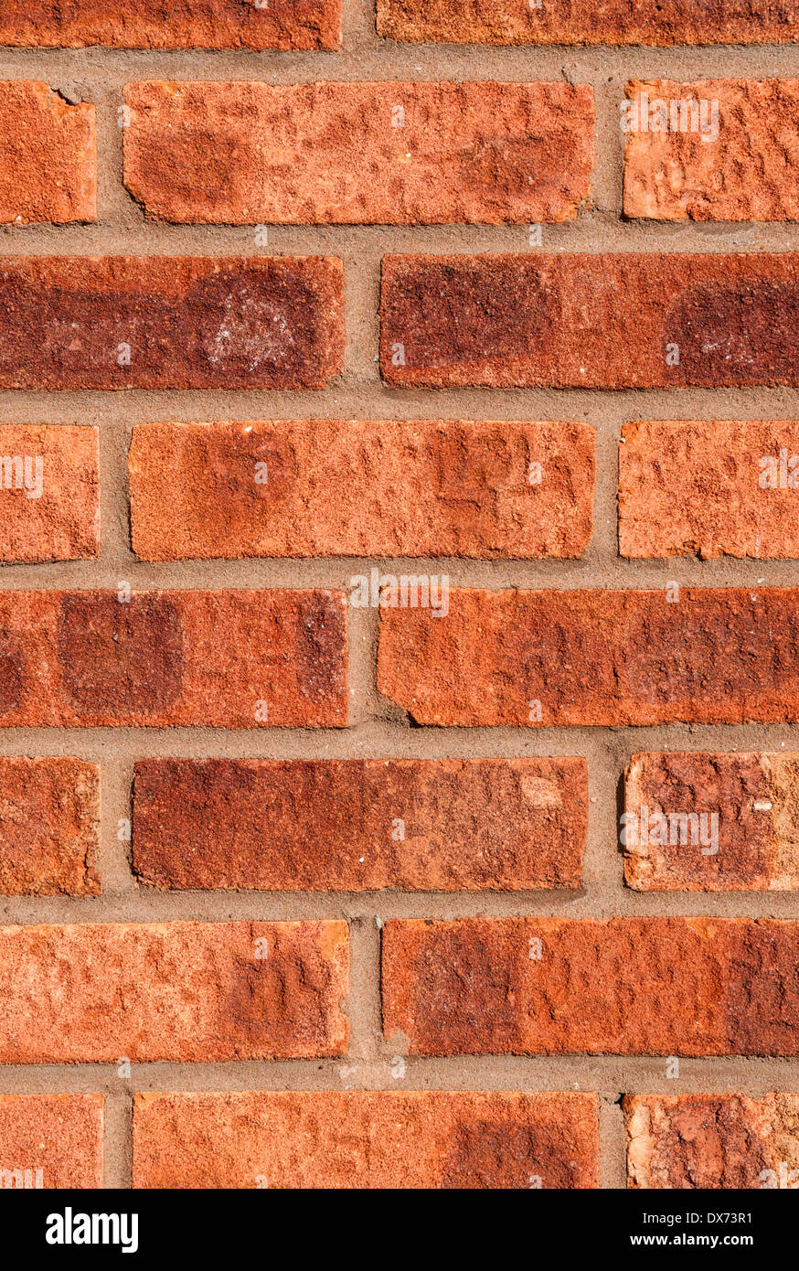 Mur de brique rouge à brun-gris, portrait, close shot moyen. Banque D'Images