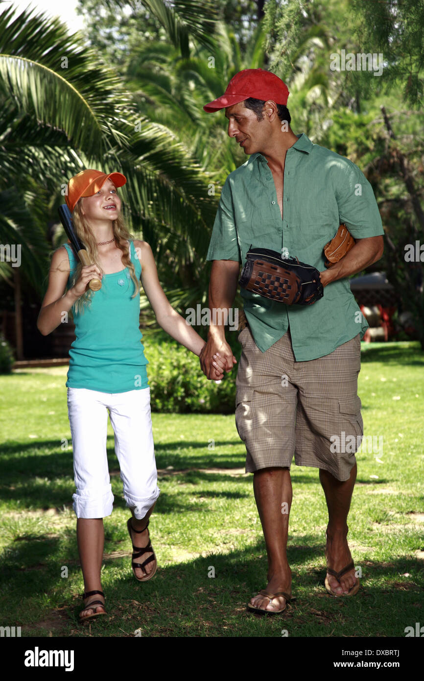 Père et fille avec le baseball outfit Banque D'Images