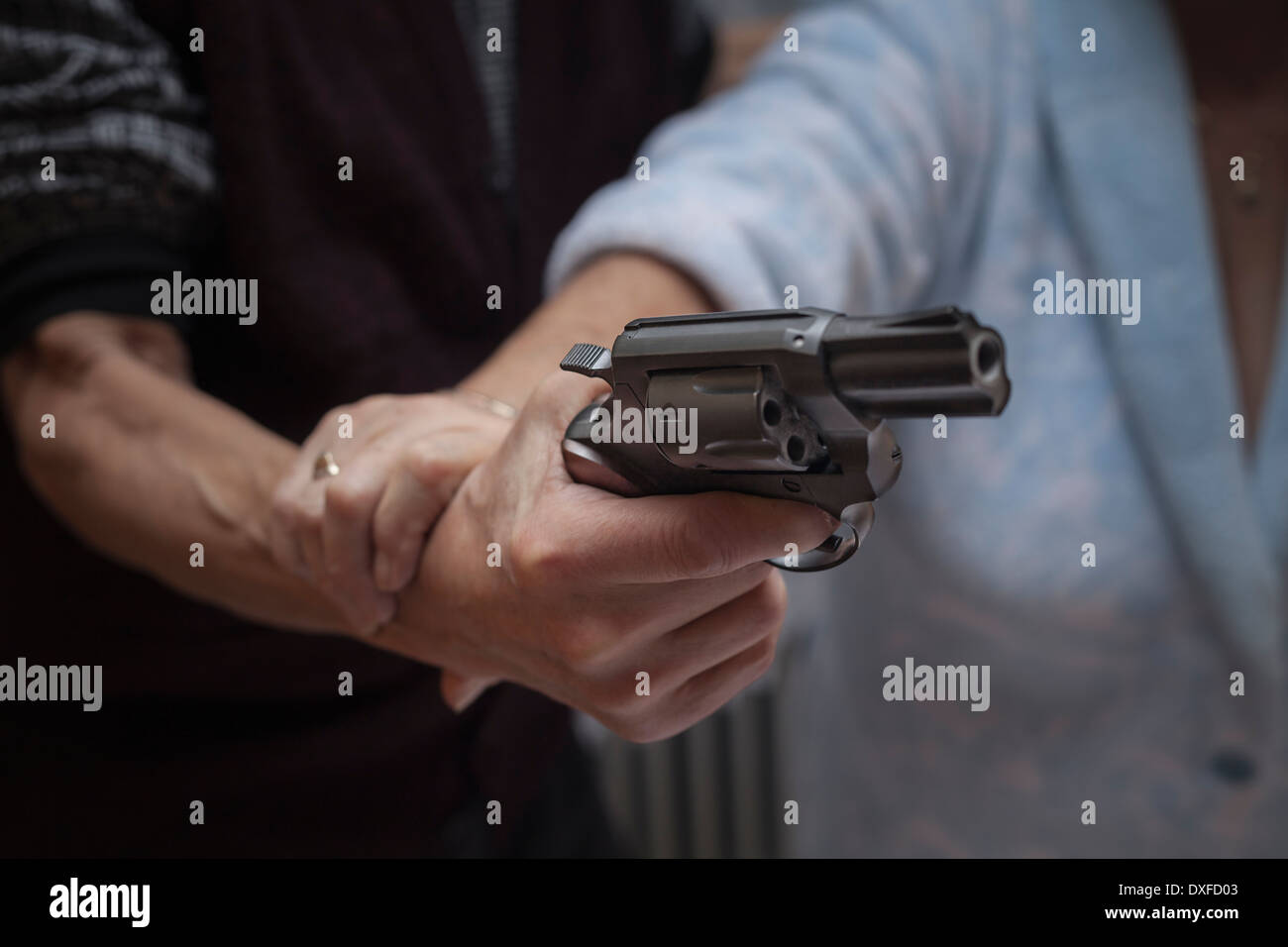 Libre d'être libre de se battre avec une arme à feu. Banque D'Images