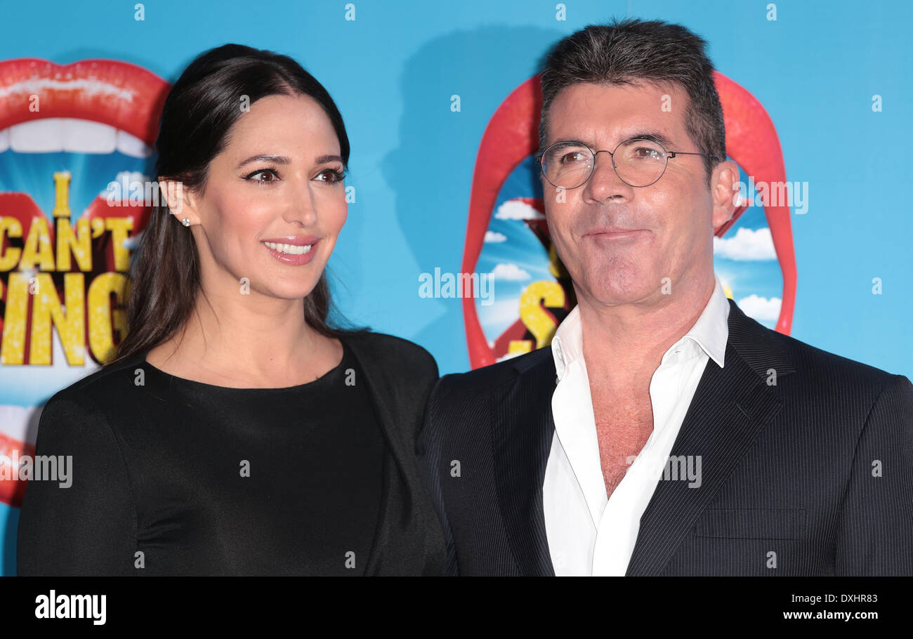 Londres, Royaume-Uni. Mar 26, 2014. Simon Cowell et Lauren Silverman assister à la nuit de la presse de la nouvelle comédie musicale "Je ne peux pas chanter" au London Palladium Photo : Alamy/MRP Live News Banque D'Images