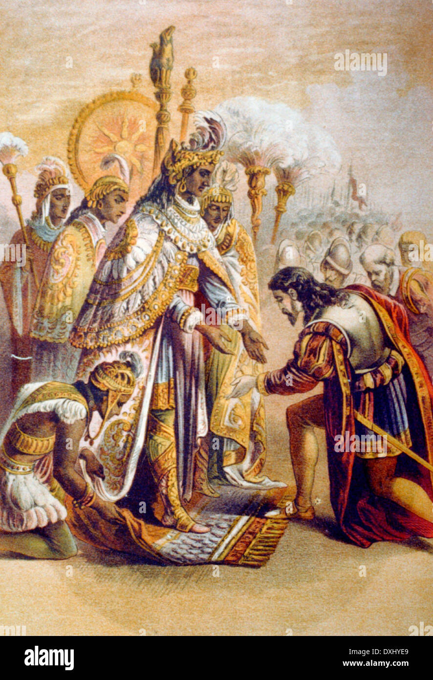 La réception d'Hernando Cortez par l'Empereur Montezuma - Cortez et ses hommes s'agenouiller à Montezuma debout dans l'attitude de bénédiction. Banque D'Images