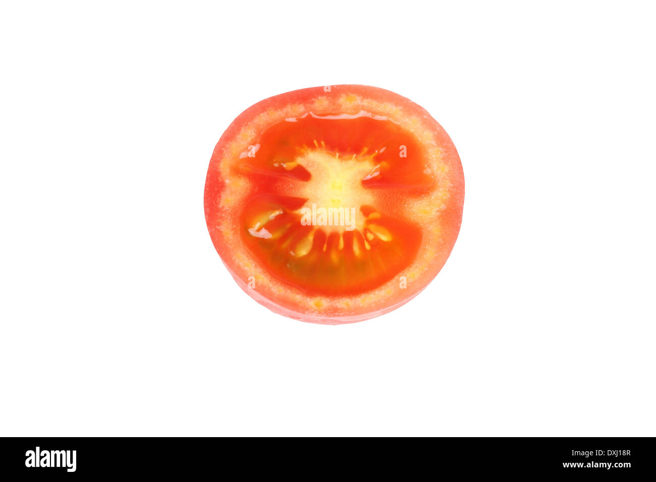 Tranche de tomate isolé sur fond blanc. Banque D'Images