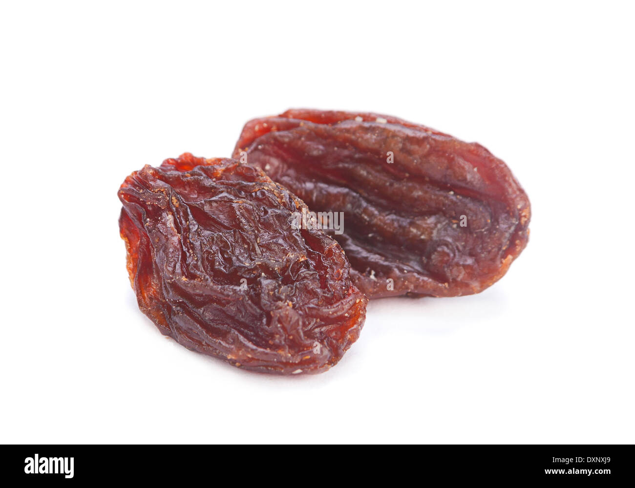 Brown closeup raisin isolated on white Banque D'Images