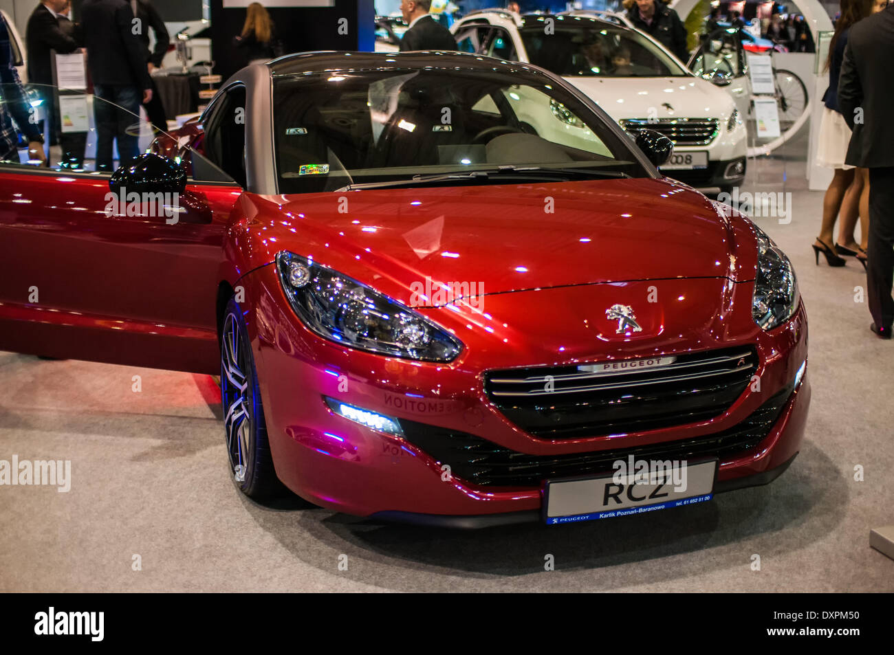 Poznan, Pologne. Mar 27, 2014. Poznan Motor Show est le plus grand événement juste en Pologne, l'industrie automobile, organisé chaque année par la foire internationale. Sur l'image Peugeot RCZ. Credit : Lukas Juszczak/Alamy Live News Banque D'Images