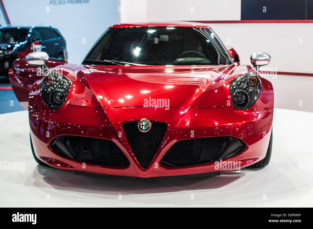 Poznan, Pologne. Mar 27, 2014. Poznan Motor Show est le plus grand événement juste en Pologne, l'industrie automobile, organisé chaque année par la foire internationale. Sur la photo l'Alfa Romeo 4C. Credit : Lukas Juszczak/Alamy Live News Banque D'Images