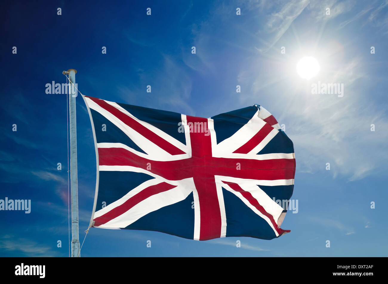 Union Jack de haut vol, against blue sky with copy space Banque D'Images