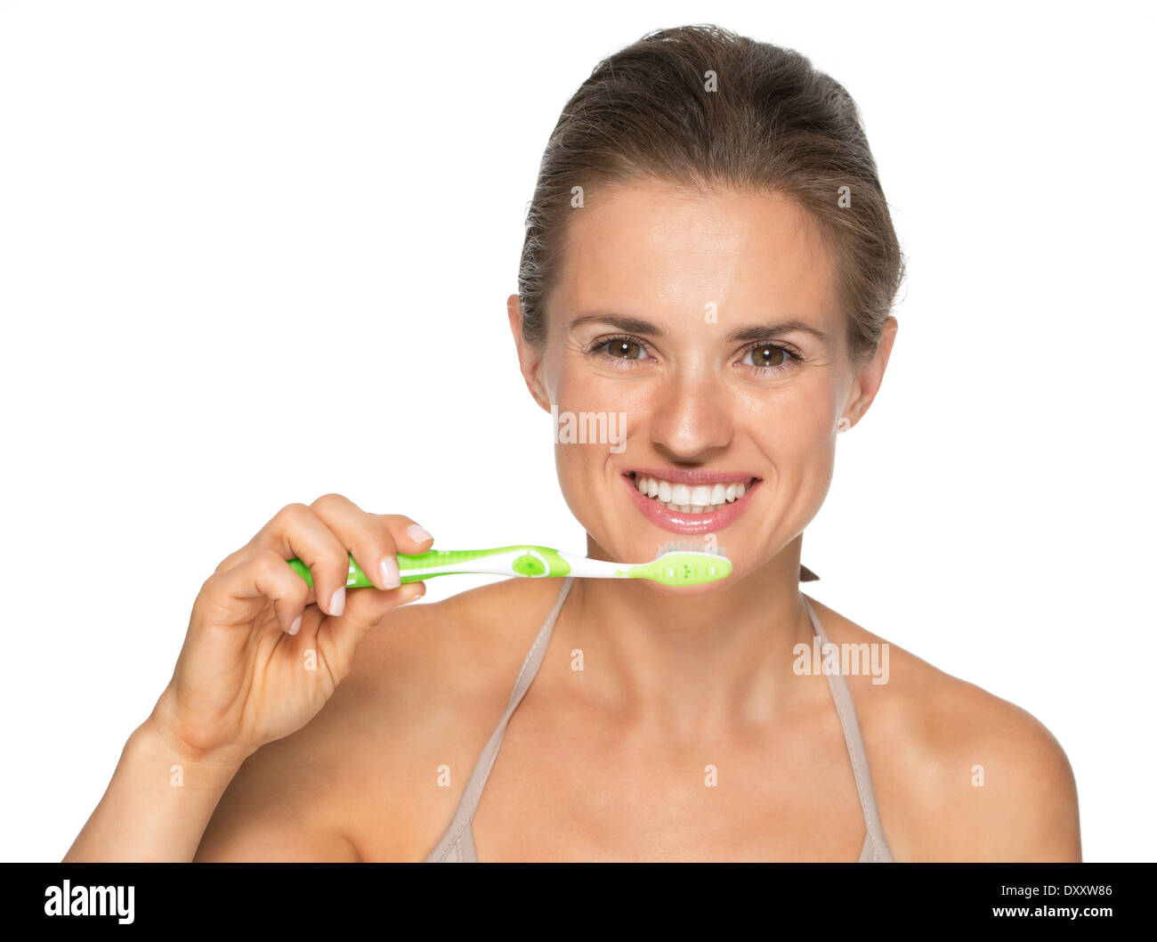 Portrait de jeune femme se brosser les dents Banque D'Images