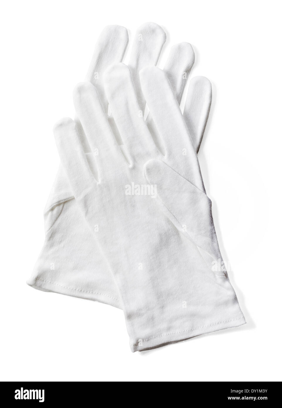 Paire de gants de coton protecteur blanc isolé sur blanc avec ombre naturelle. Banque D'Images