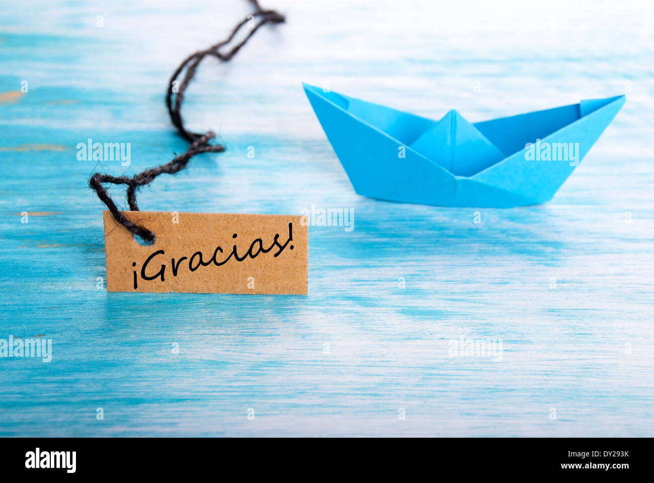 L'étiquette avec le mot espagnol Gracias ce qui signifie Grâce et un bateau Banque D'Images