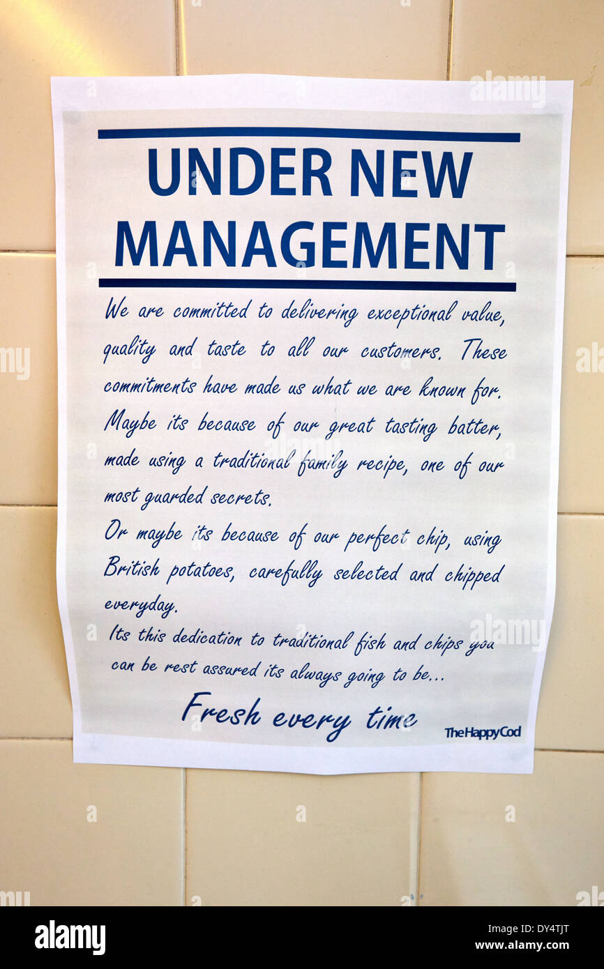 Inscrivez-lecture sous une nouvelle direction dans un poisson et chip shop Banque D'Images
