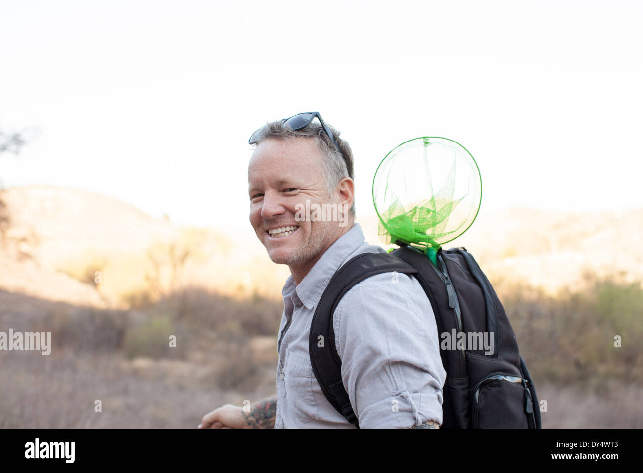 Candid portrait of smiling male hiker Banque D'Images