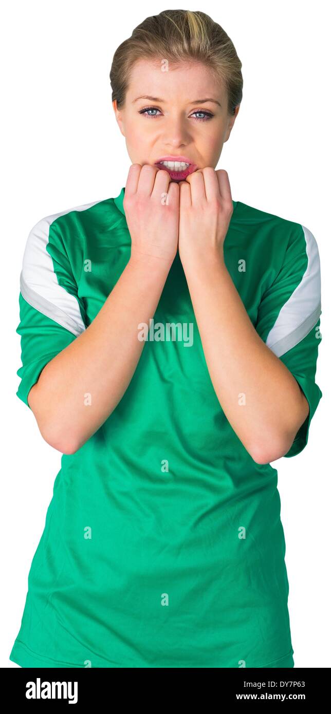 Fan de football nerveux en vert Banque D'Images