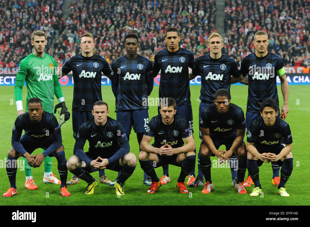 Munich, Allemagne. 09 avr, 2014. L'équipe de Manchester avec gardien de but David de Gea (ARRIÈRE, L-R), Phil Jones, Danny Welbeck, Chris Smalling, Darren Fletcher, et Nemanja Vidic, (avant, L-R) Patrice Evra, Wayne Rooney, Michael Carrick, Antonio Valencia et Shinji Kagawa est photographié avant le quart de finale de la Ligue des Champions entre le FC Bayern Munich et Manchester United à l'Arena de Munich, Allemagne, 09 avril 2014. Munich a remporté le match 3-1. Photo : Andreas Gebert/dpa/Alamy Live News Banque D'Images