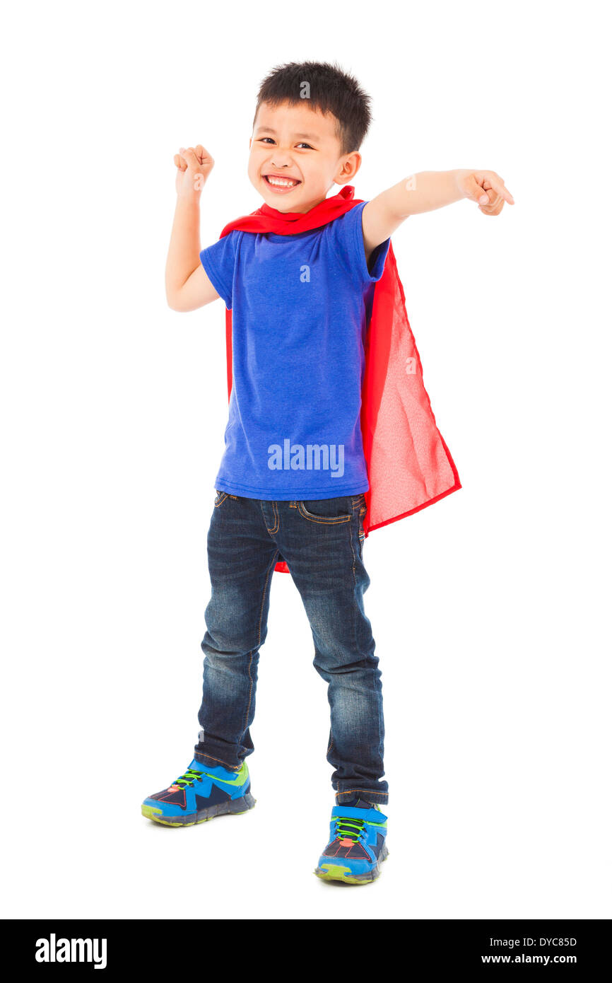 Kid superhero standing in studio Banque D'Images