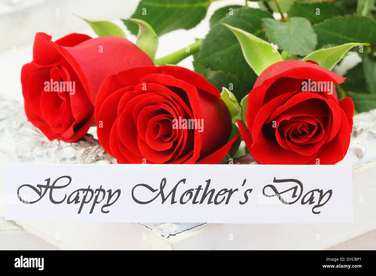 Happy Mother's Day card avec trois roses rouges Banque D'Images