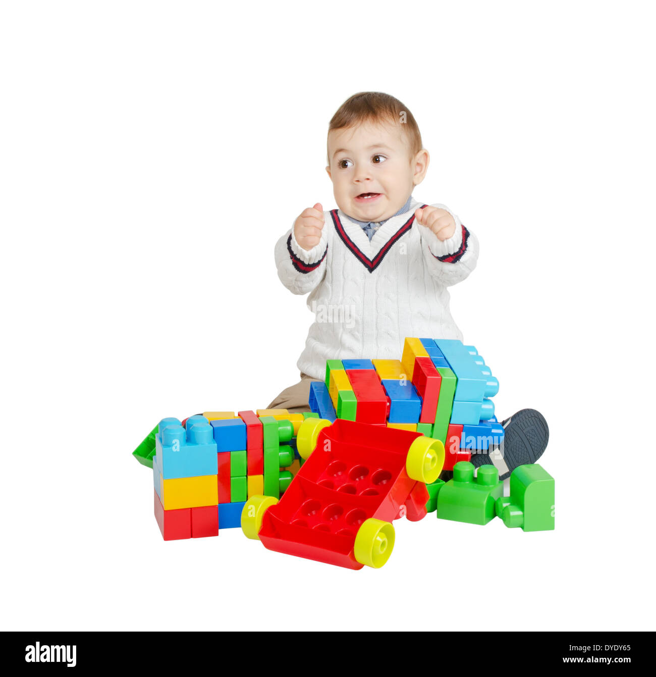 Garçon en colère avec des jouets en plastique coloré isolated on white Banque D'Images