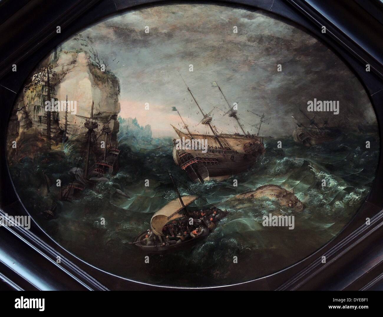 Naufrage au large d'une côte rocheuse par Adam Willaerts (1577-1664) huile sur panneau, 1614. Ceux qui sont allés à la mer joué la roulette avec leur vie. Les navires en bois étaient petites et fragiles et les dangers très réels ont été exagérées avec des histoires d'horreur de créatures hideuses vivant dans les profondeurs insondables. Willaerts créé une image de chaque seaman's pire cauchemar. Un navire a été brisé sur les rochers, et les deux y sont plus de gîte. Les survivants au centre sont menacés par un poisson monstrueux. Banque D'Images