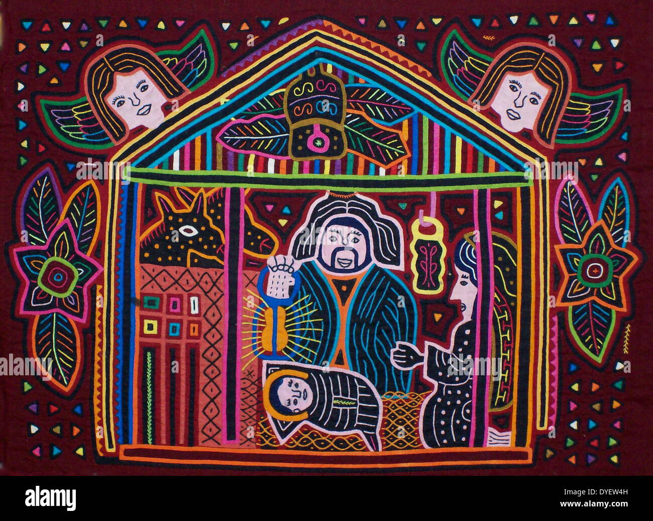 Mola Kuna par artiste textile indien, représentant une scène biblique. À partir de l'archipel des San Blas, Panama. Design en applique inverse portés sur femme blouse. La nativité. Banque D'Images